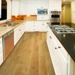 Dream kitchen with marble and granite counters | Reinhold Flooring