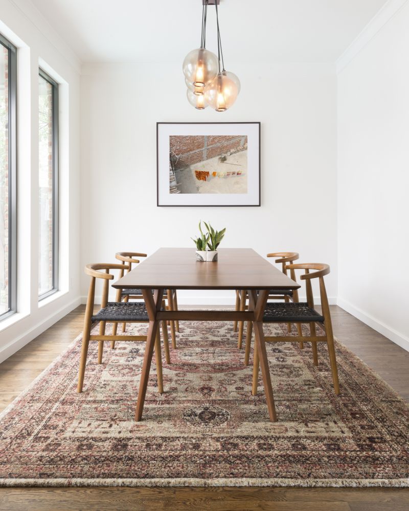 Use an Area Rug to Elevate Your Dining Room | Reinhold Flooring