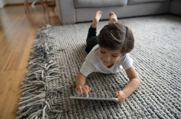 Girl lying on rug | Reinhold Flooring