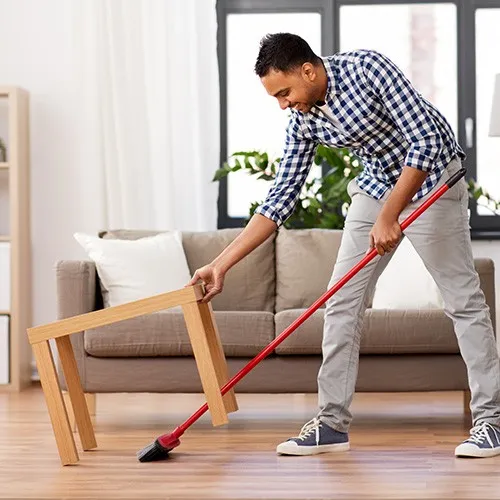 Man cleaning floor | Reinhold Flooring