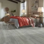 Spacious bedroom laminate flooring | Reinhold Flooring